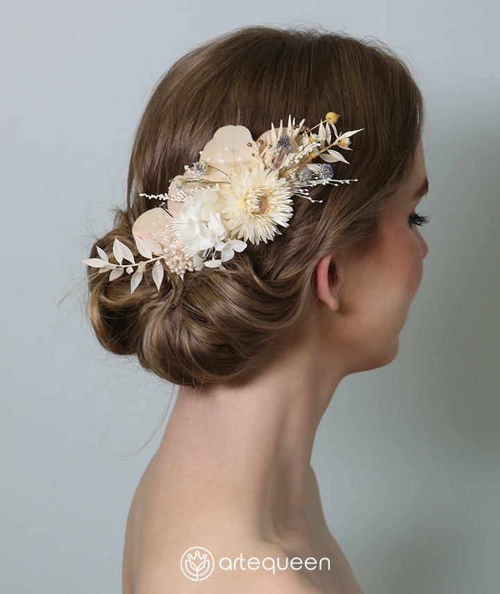 Bridal haircomb made with naturally preserved pink ivory straw rice flower
