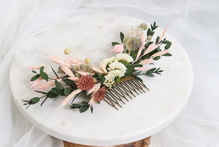Bridal haircomb made with naturally preserved white pink green mixed flower